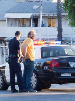 Stand up comedian DJ Dangler being arrested